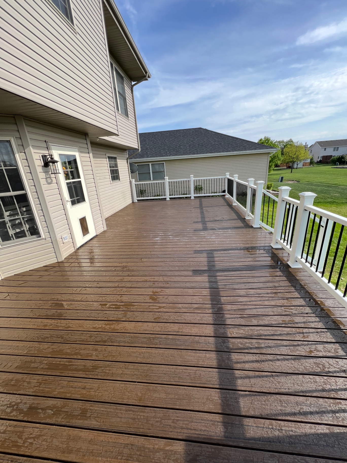 Brown Deck with White Rail